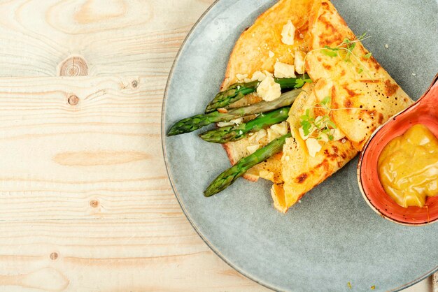 Omelet with fresh asparagus