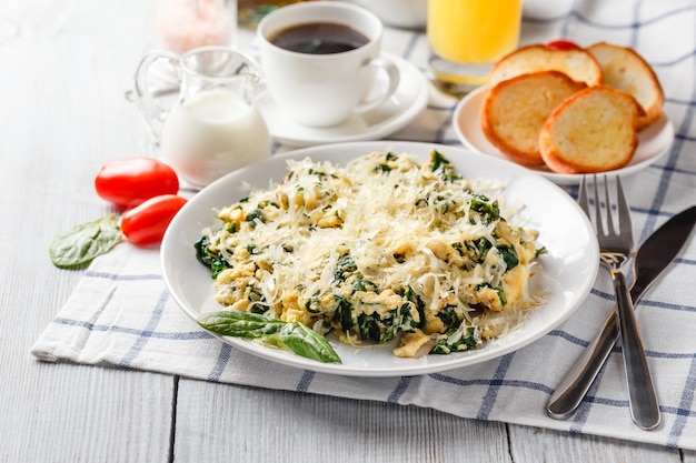 Omelet with spinach and cheese on a plate