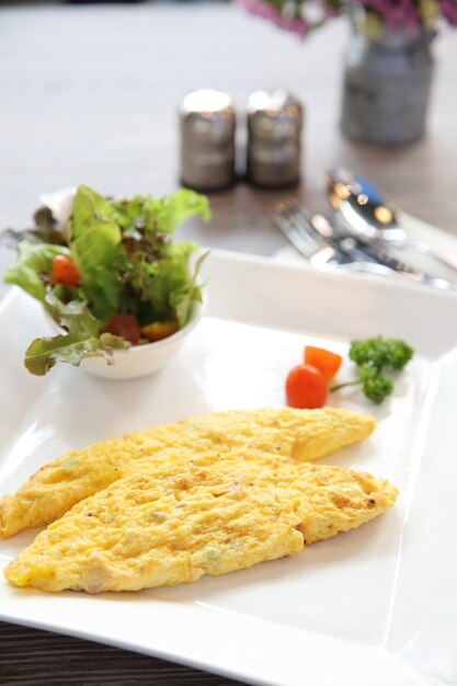 Omelette on wood background