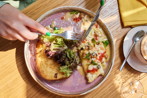 Omlet with mushrooms in a pan on a concrete background Fritata is an Italian breakfast dish