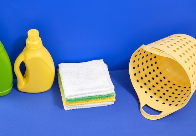 Oncept of order Laundry basket towels and detergent