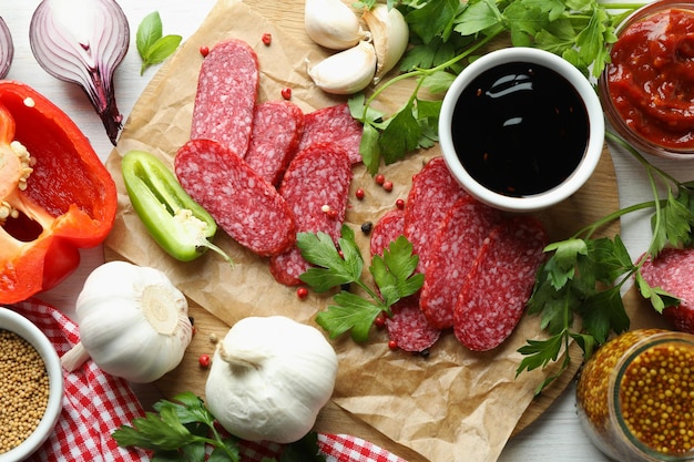 ÃÂ¡oncept of tasty food with salami sausage, close up