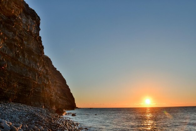 Ondergaande zon aan de Atlantische Oceaan op Tenerife, Canarische Eilanden, Spanje