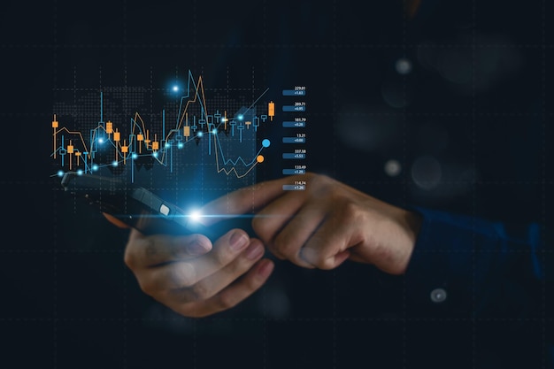 Ondernemer die forex trading grafiek financiële gegevens analyseert Zakelijke financiën achtergrond zakelijke financiën technologie en beleggingsconcept Aandelenmarkt Investeringen Fondsen en digitale activa