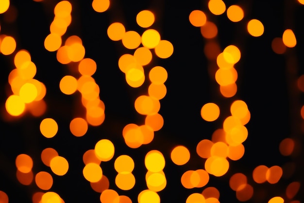 Onduidelijke kerst achtergrond en bokeh affocus geel licht kleur fortuna goud