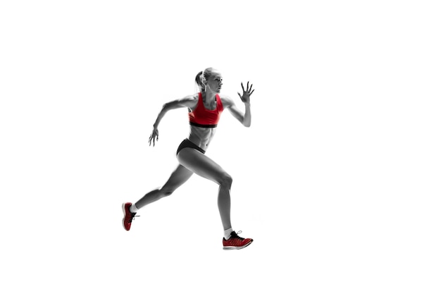 The one caucasian female silhouette of runner running and jumping on white studio background. The sprinter, jogger, exercise, workout, fitness, training, jogging concept.