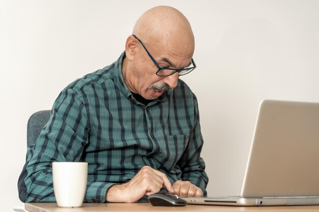 One Caucasian Senior Business Man Computing Laptop Surprised on White Background