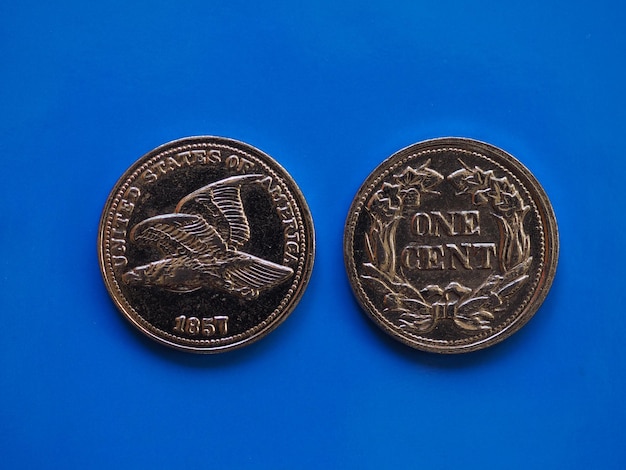 Один цент 1857 года над синим