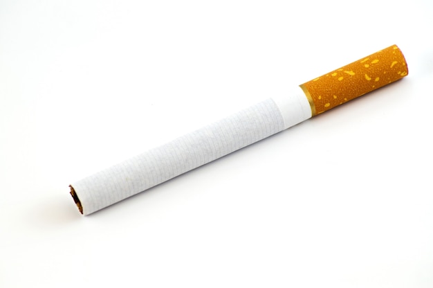 One cigarette on a white isolated