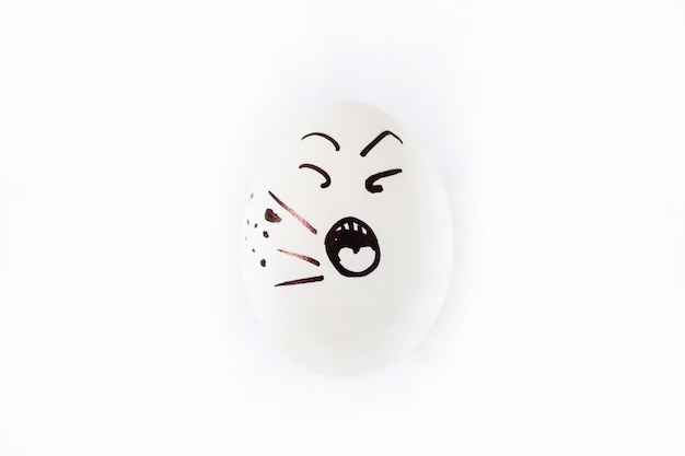 Photo one egg with screaming sad drawn face