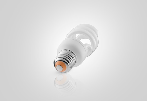 One energy saving lamp on a white background with reflection