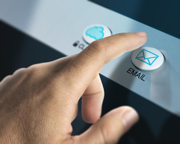 One finger pressing an email button to check for emails, concept of communication or mailbox.