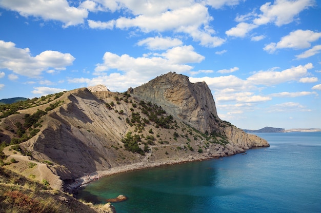 One from a fanciful bays of "Novyj Svit" reserve (Crimea, Ukraine). People is unrecognizable.