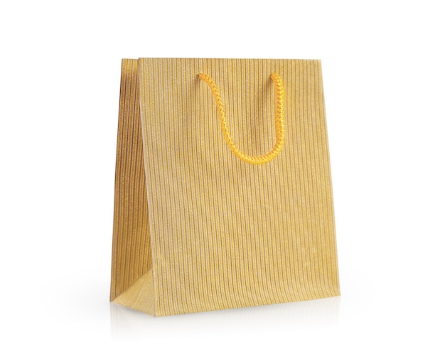 one golden paper gift bag highlighted on a white background.