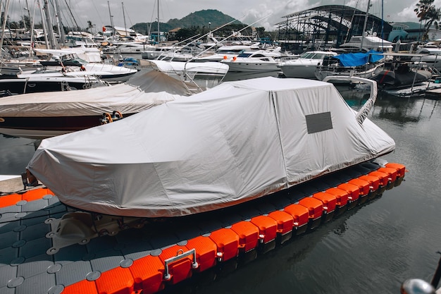 One huge covered yacht is standing for maintenance and repairing