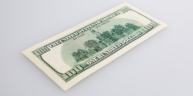 One hundred dollar cash bill on a light background. Layout, mockup, place for lettering and logo.