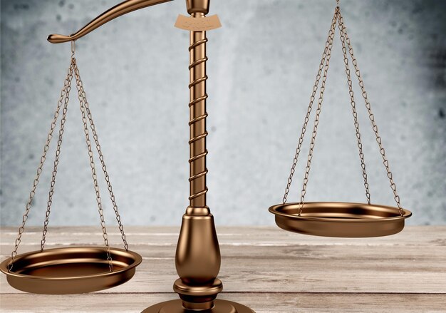 One law scales on wooden table