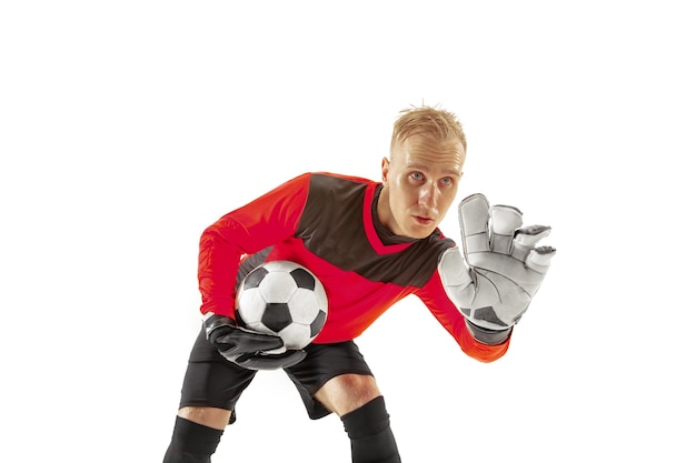 One male soccer player goalkeeper pointing away and screaming isolated on white background. Appeal to the referee, order to defenders and human emotions concept