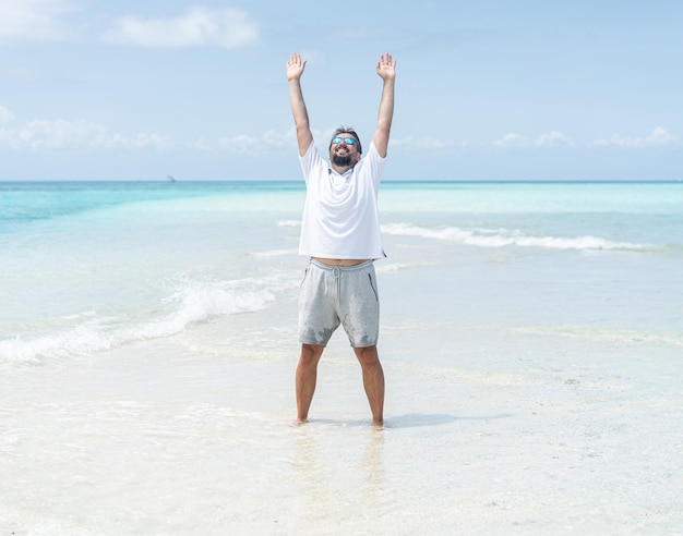 One man is enjoying beautiful tropical beach