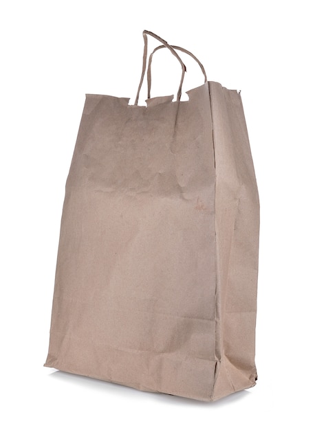 One paper shopping bag on white