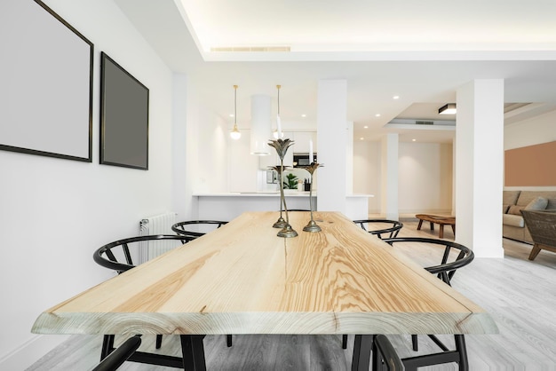 One piece pine wood dining table in natural color in the living room of a short term rental apartment