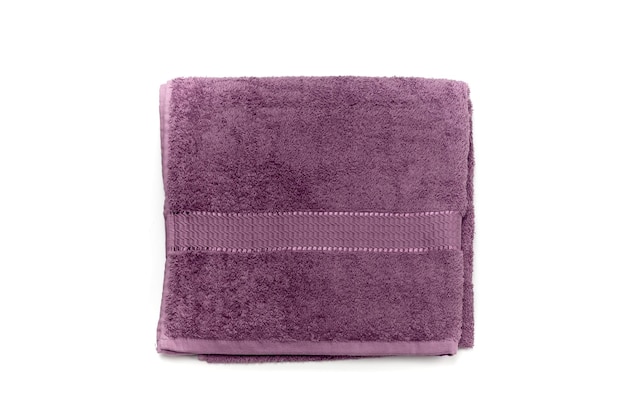 One purple towel on a white background