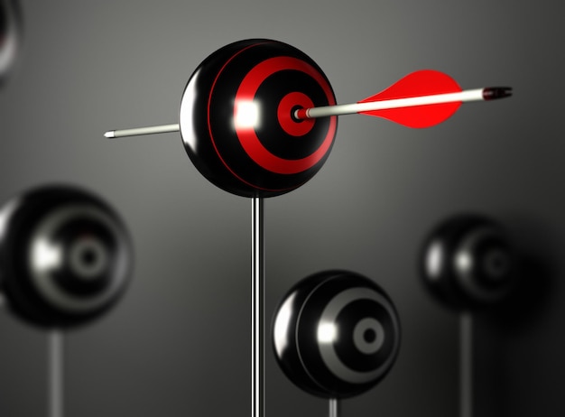 Foto una freccia rossa che colpisce il centro di un bersaglio a sfera con altri bersagli sfocati intorno, sfondo nero con effetto luce