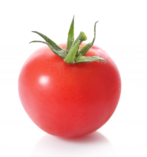 One ripe red tomato isolated on white background