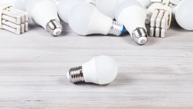 Photo one white led bulb light and energysaving lamps