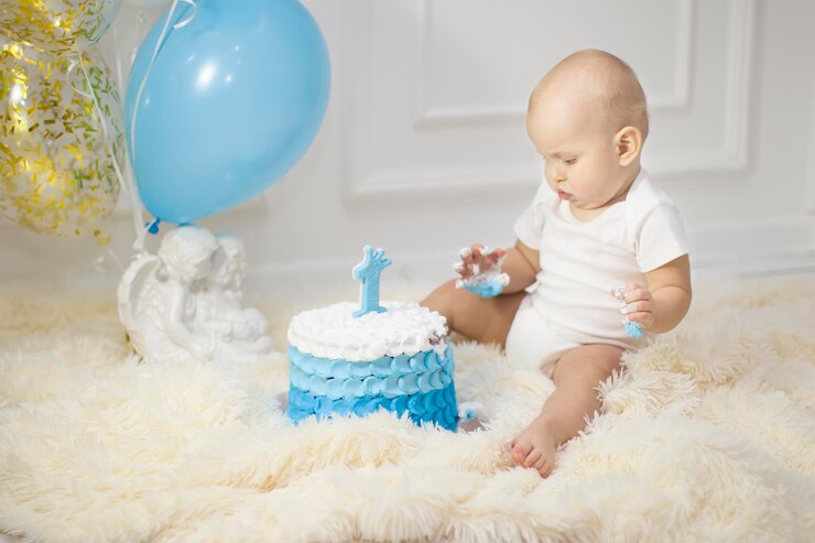 One year old child with a birthday cake First birthday