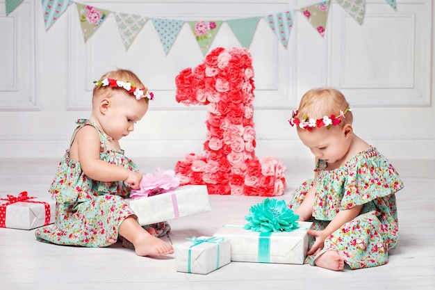 One-year-old twins on the birthday.