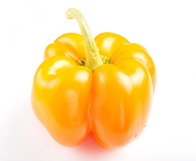 One yellow sweet pepper isolated on white background.
