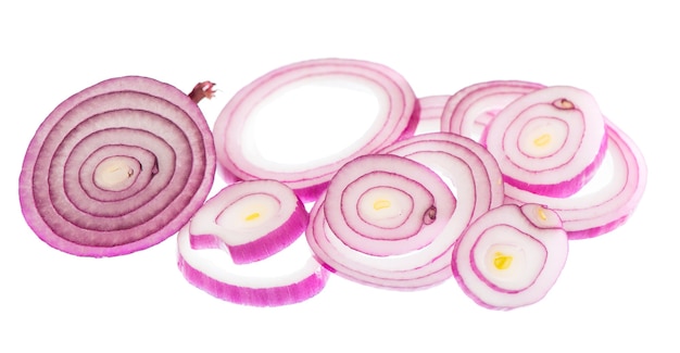 Onion cut into rings drops on white background