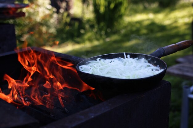 Onion fry on fire outdoors