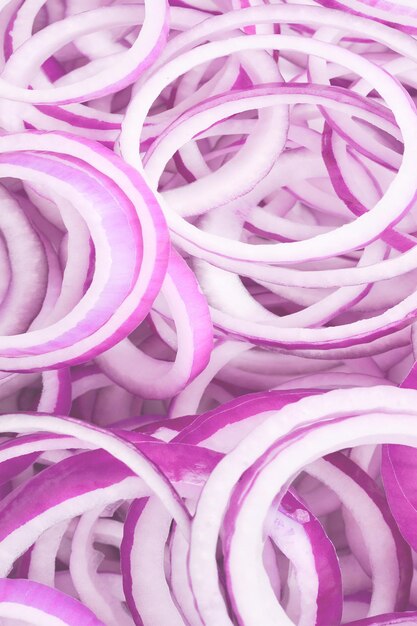 Onion rings as a background top view