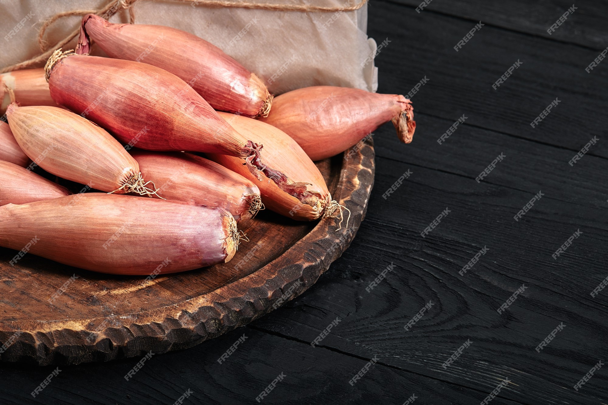 Premium Photo  Onion shallot on a black, dark background eating vegetables  and eating healthy eating shallots adding to various dishes, diversifying  food