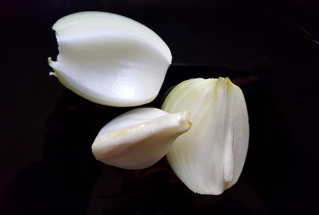 onion slices isolated on a black bakgrpound