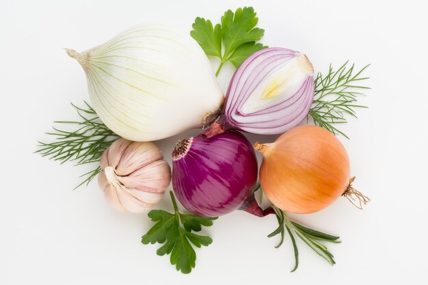 Onion and spices isolated on white background, top view.