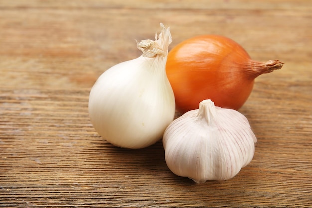 Onion on wooden background