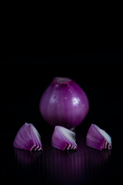 Photo onions on black background