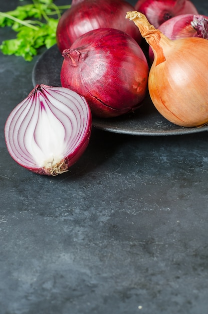 Onions in a black plate