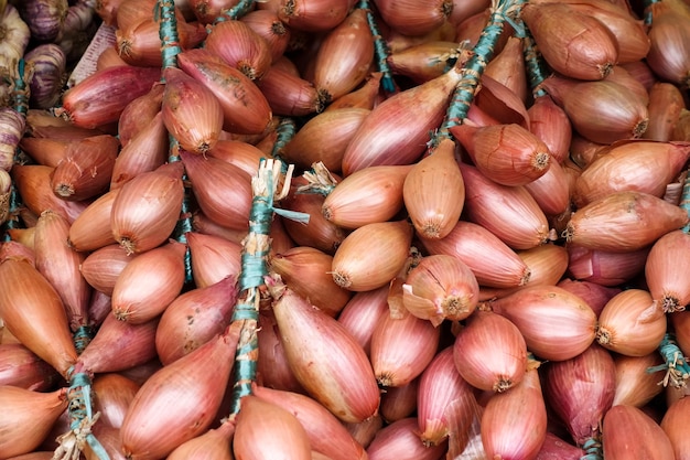 Onions for sale on a market stall