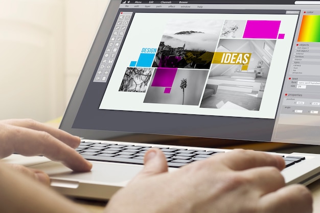 Foto concetto di business online. uomo che utilizza un computer portatile con software di progettazione grafica sullo schermo.
