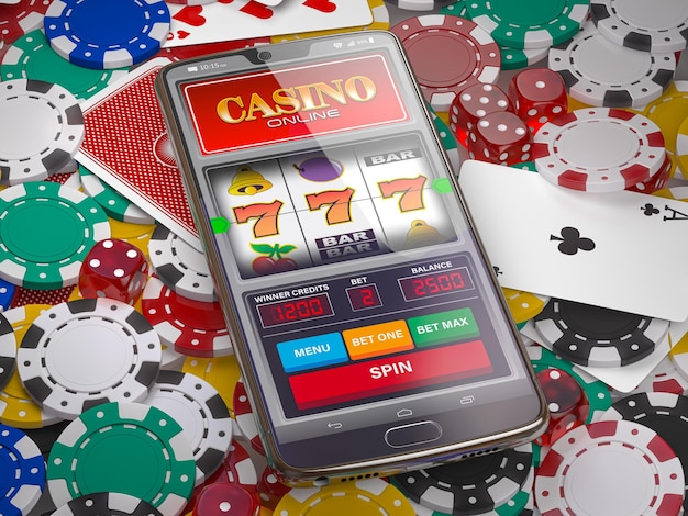 Online casino Slot machine on smartphone screen dice casino chips and cards