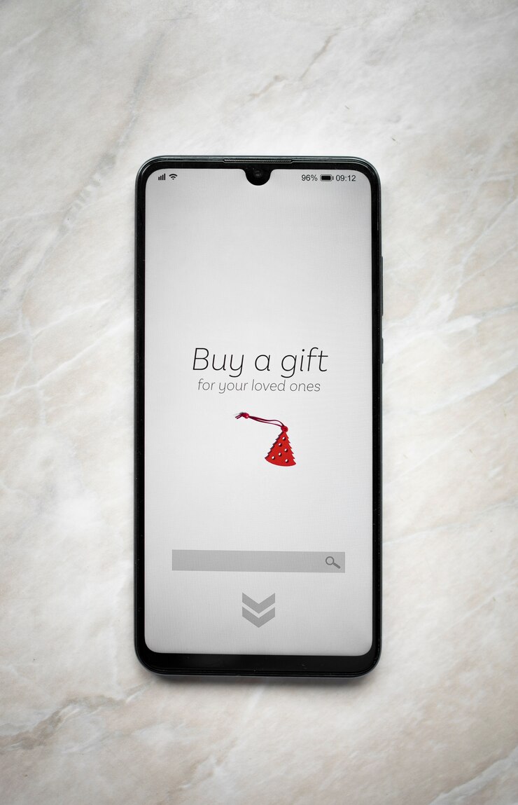 Online Christmas store concept for the shopping via mobile phone