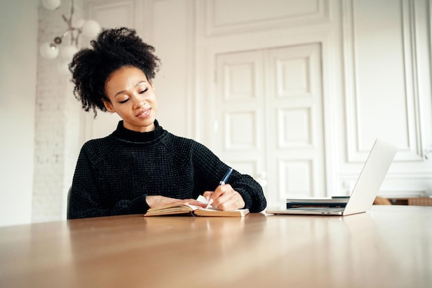 Online distance learning communicates with the teacher A woman