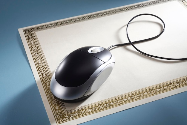 online education certificate with computer mouse