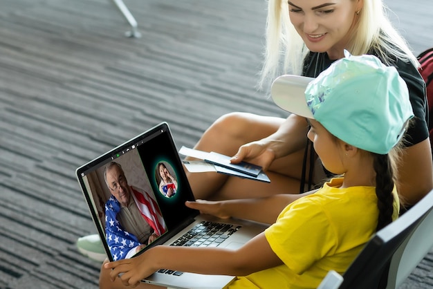 Photo online group videoconference on laptop, family