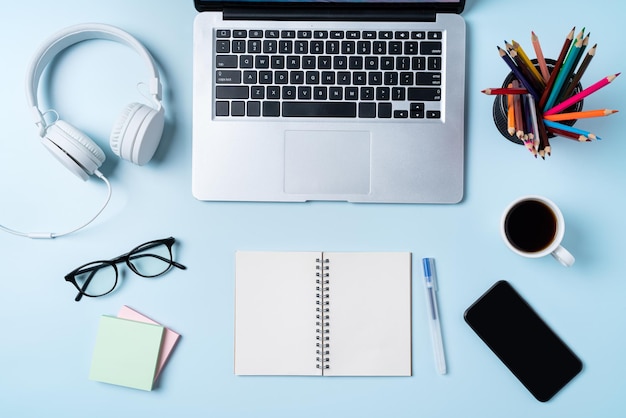 Online learning design concept Table with tablet headphone and stationeries