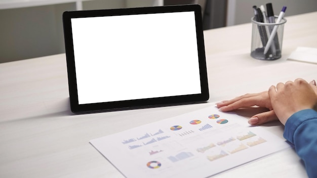 Online meeting video woman hands graphs tablet
